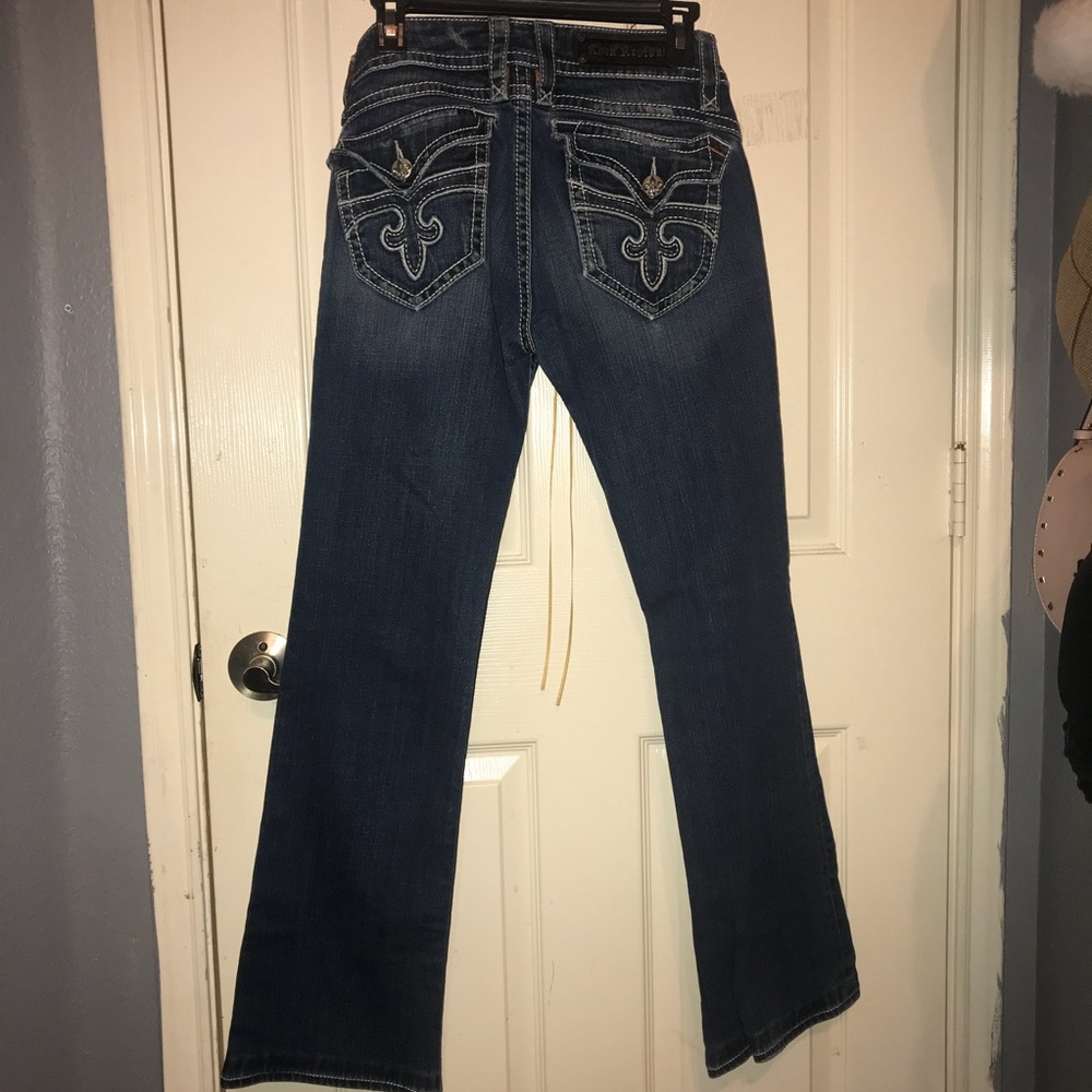 Slightly used women’s rock revival boot cut jeans